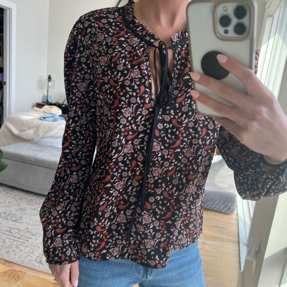 Patterned blouse size small with tie front